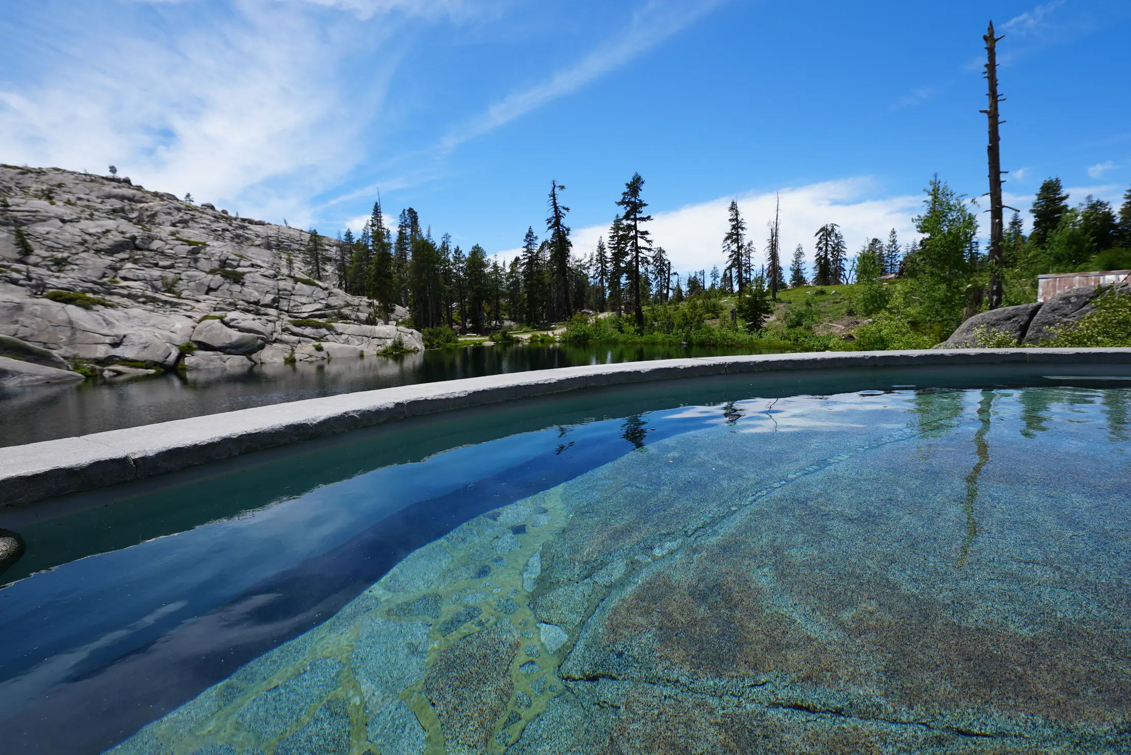 The Hot Tub — Thirty people, cut into the rock